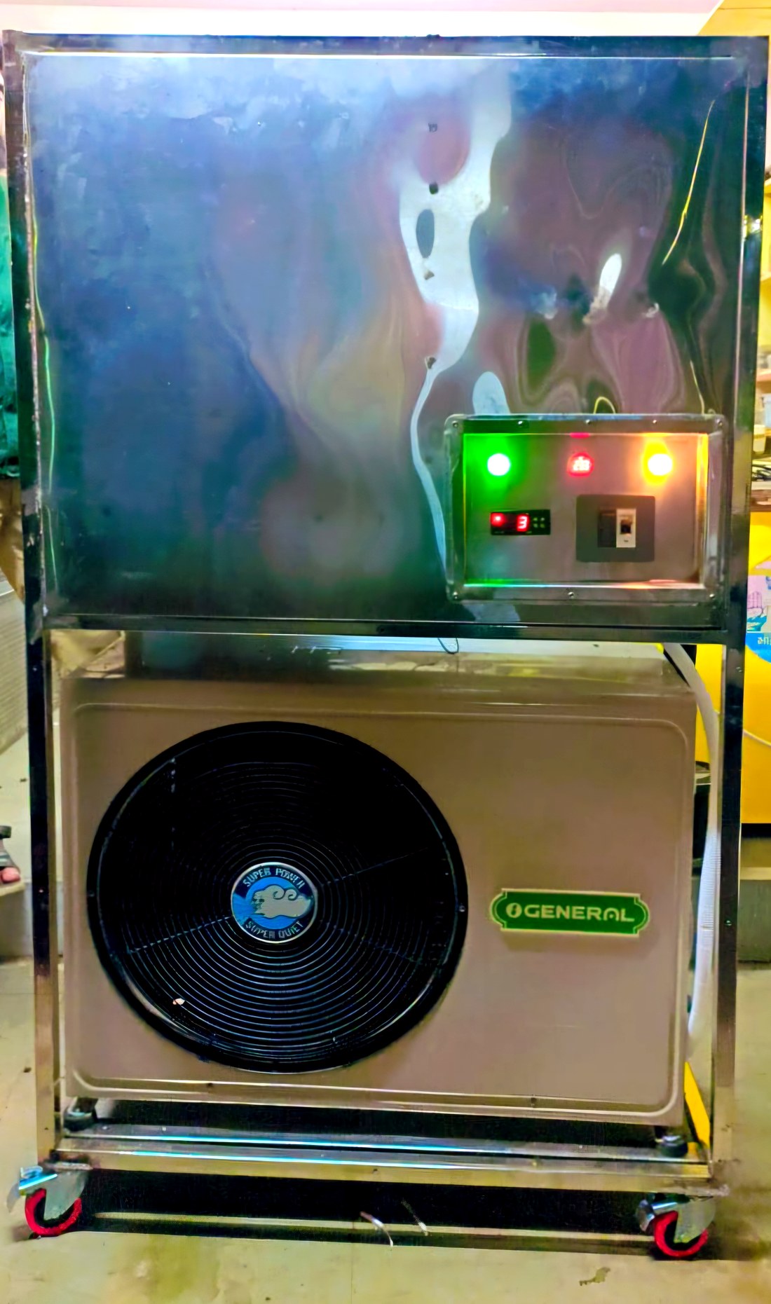 The complete CoreVault node, sealed immersion chamber above and heat rejection stage below